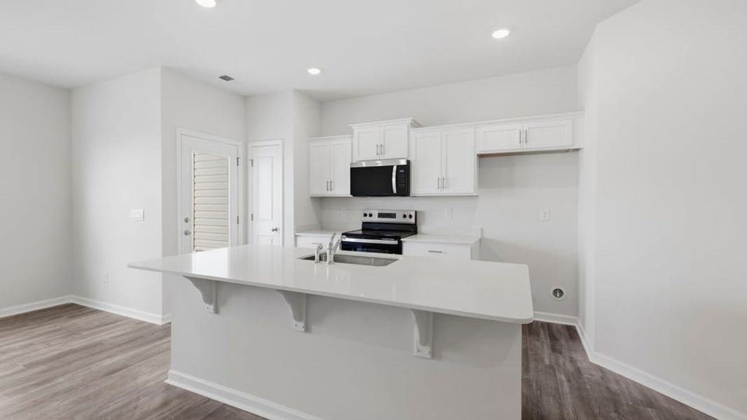 Furnished interior view inside a new home in Tanglewood Townes, Greenville (Image 8).