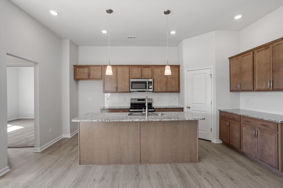 Furnished interior view inside a new home in Cambridge Reserve, Angier (Image 7).