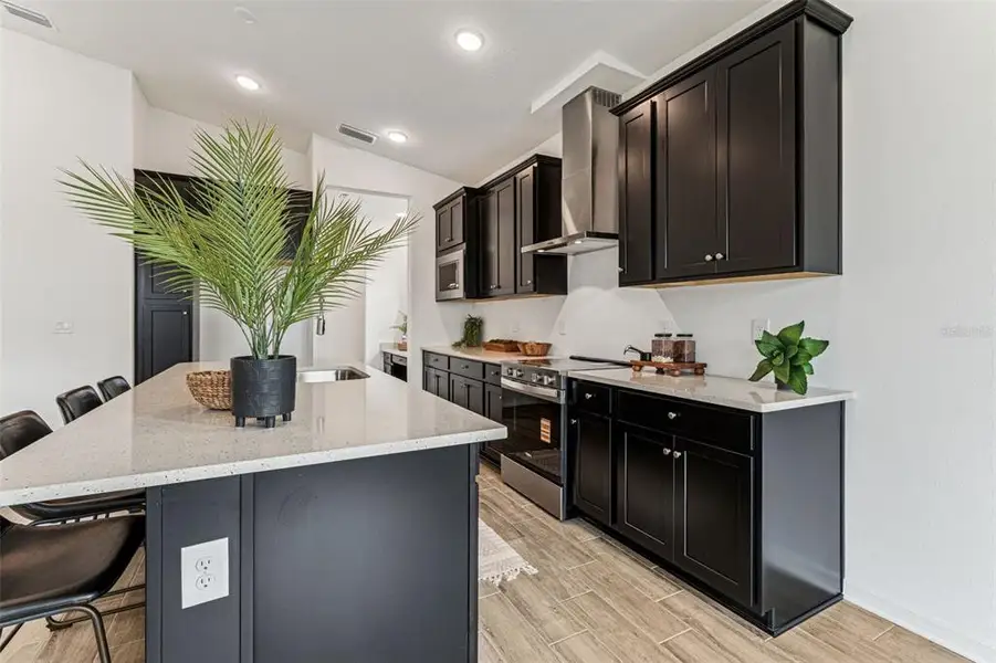 Furnished interior view inside a new home in Isles at Bayview, Parrish (Image 8). Furnished interior view inside a new home in Isles at Bayview, Parrish (Image 8).