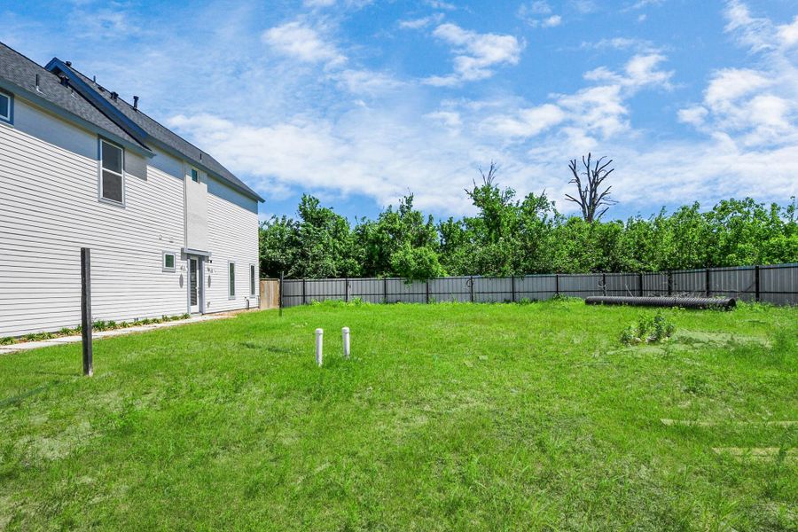 Front exterior of a new home in , Houston, TX, highlighting curb appeal (Image 26).