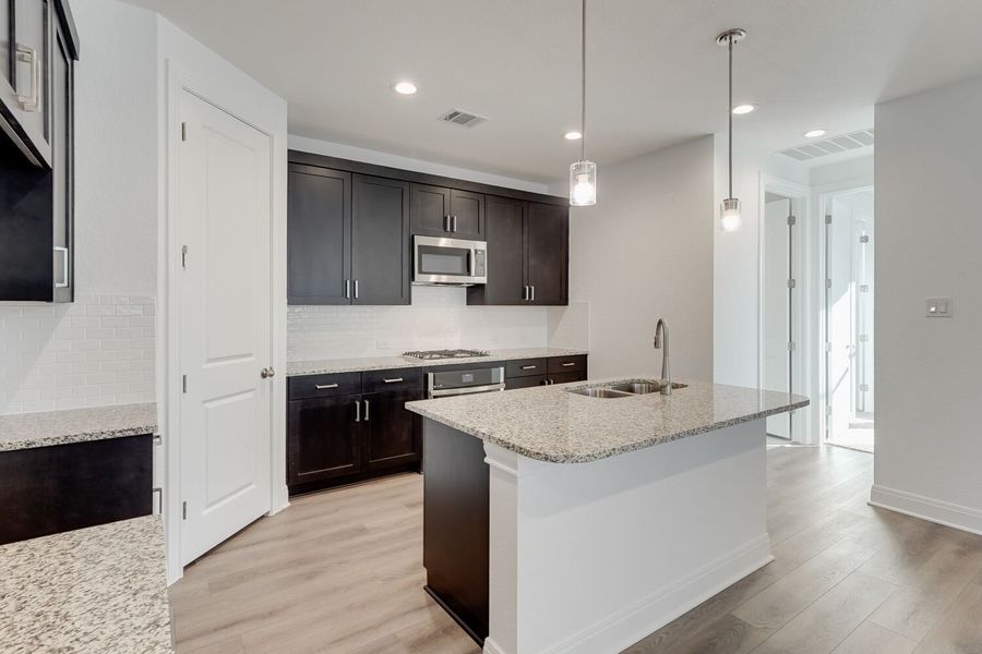 Furnished interior view inside a new home in The Porch at Du Pre, Buda (Image 3).
