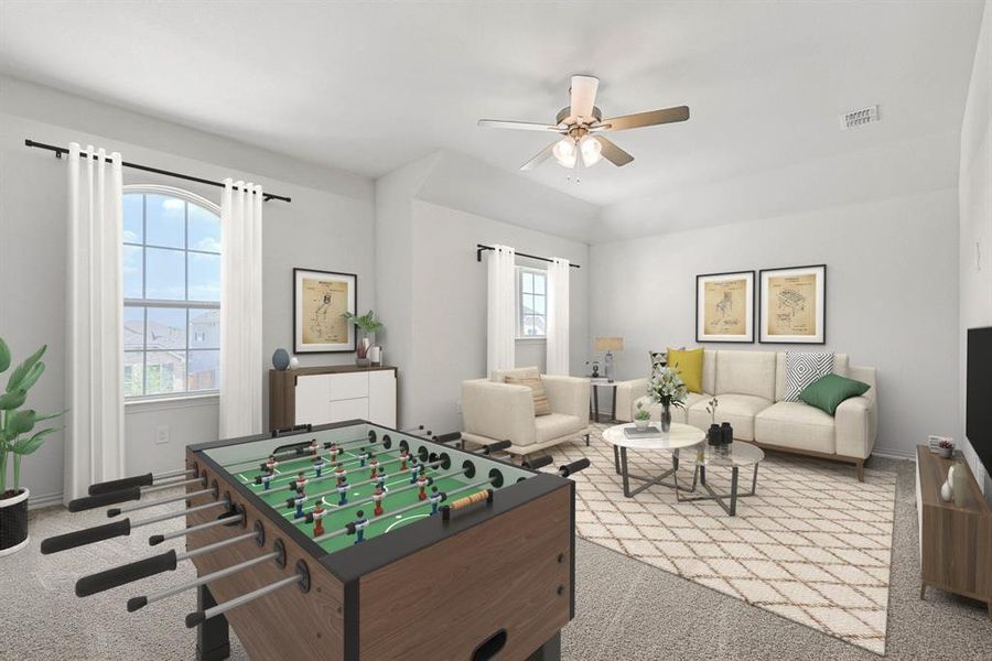 Game room featuring light colored carpet, a healthy amount of sunlight, and ceiling fan