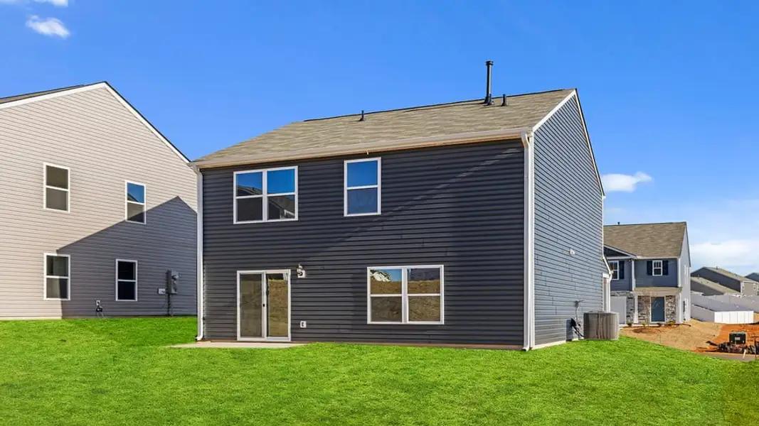 Exterior details and patio area of a home in Harper Ridge, Roebuck (Image 22).
