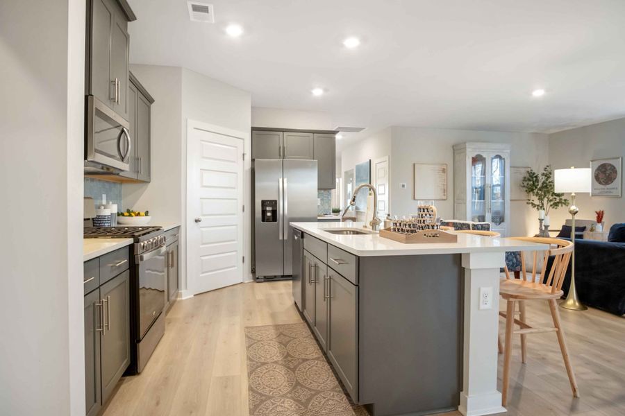 Representative furnished interior of a home built from the CLIFTON by D.R. Horton in Nexus South, Gallatin (Image 16).