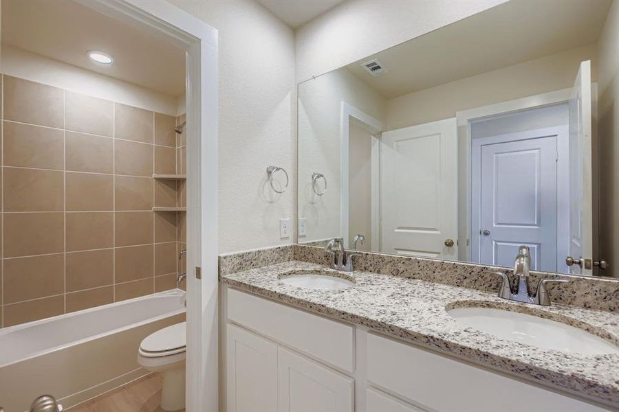 Furnished interior view inside a new home in Sperling Farms, Ferris (Image 8).