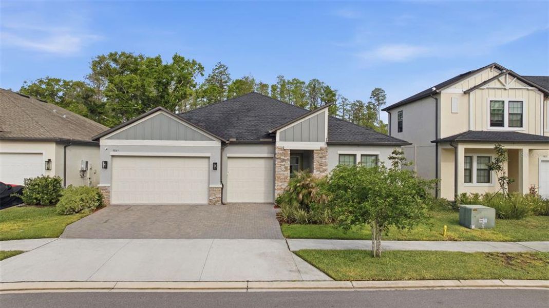 Front exterior of a new home in , Land O' Lakes, FL, highlighting curb appeal (Image 28).