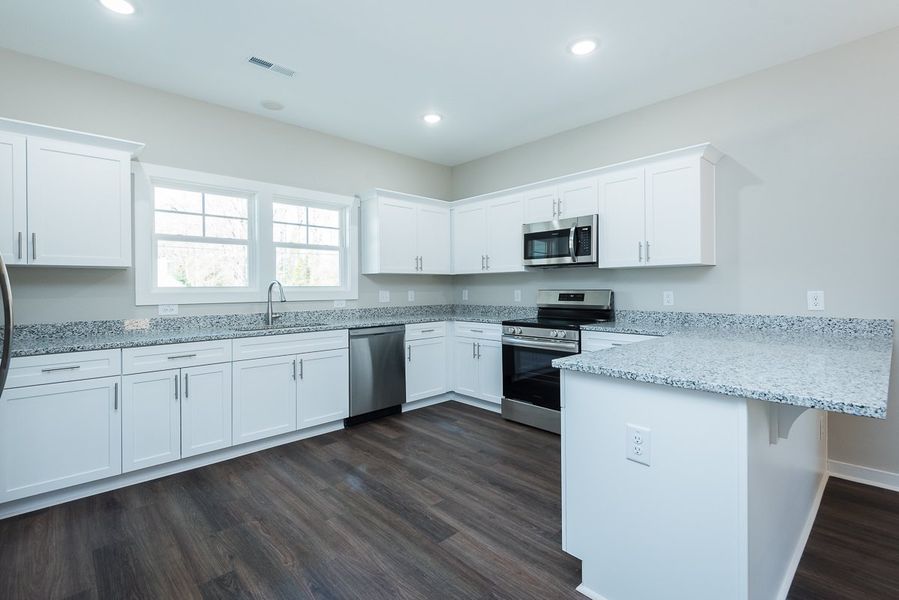 Representative furnished interior of a home built from the Ford by Foundation Home Builders LLC in Pallini Place, Ossipee (Image 10).
