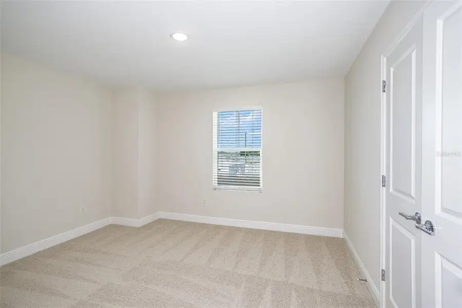 Spacious, unfurnished interior of a new home in Pasadena Landing, Wesley Chapel (Image 23).