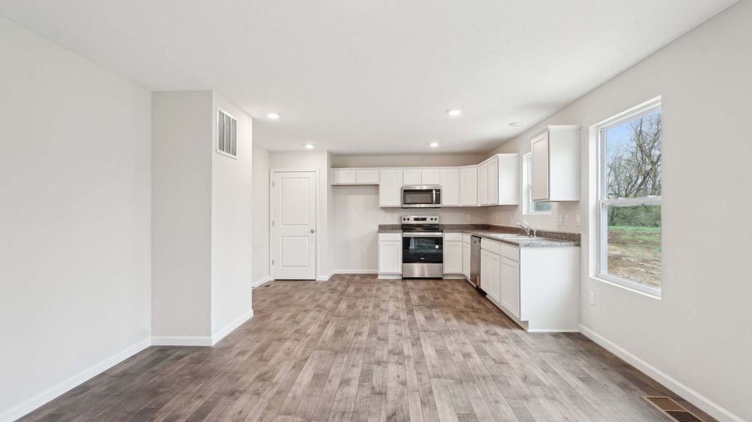 Spacious, unfurnished interior of a new home in The Pines at Blake Farm, Wilmington (Image 11). Spacious, unfurnished interior of a new home in The Pines at Blake Farm, Wilmington (Image 11).