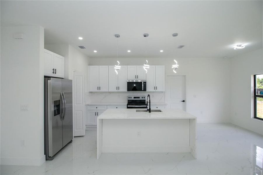 Furnished interior view inside a new home in , Lehigh Acres (Image 9).