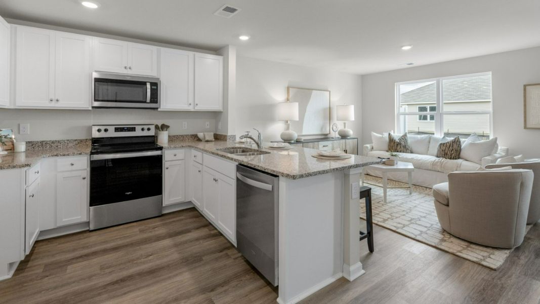 Representative furnished interior of a home built from the PEARSON TOWNHOME by D.R. Horton in Grayson Park Townhomes, Leland (Image 7).