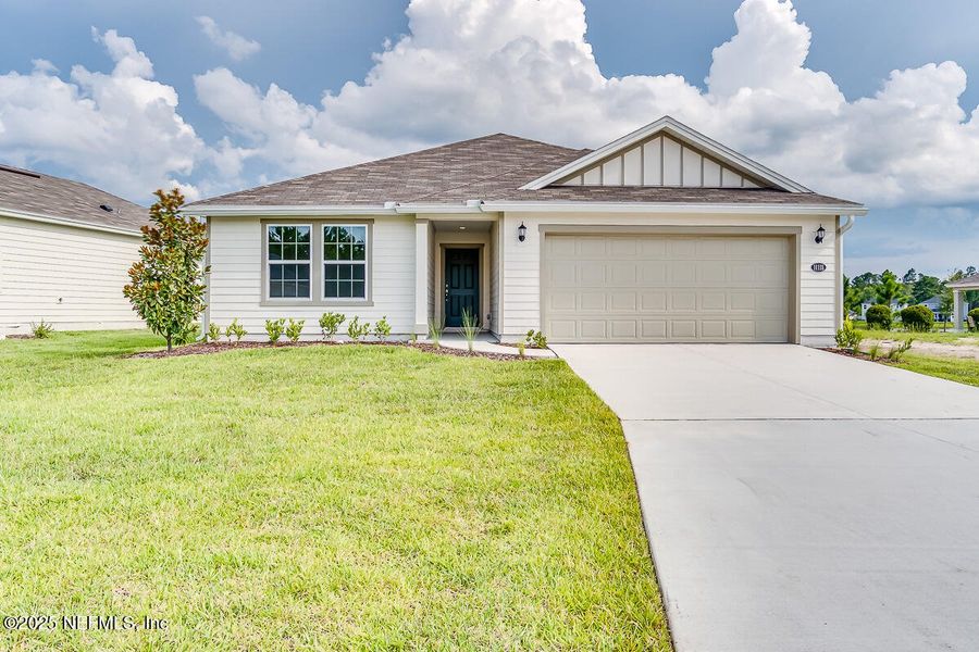 Front exterior of a new home in Copper Ridge, Jacksonville, FL, highlighting curb appeal (Image 15).