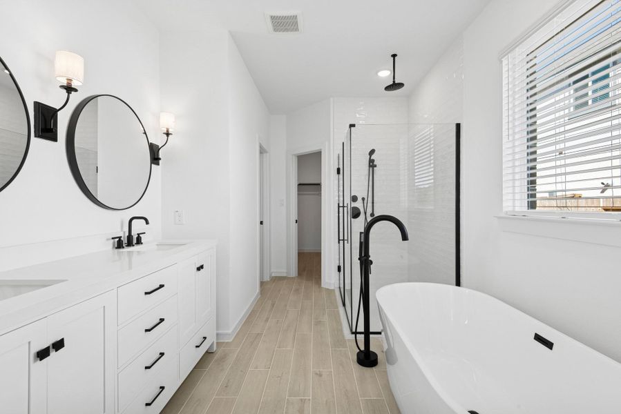 Luxurious primary bath (*Photo not of actual home and used for illustration purposes only.)