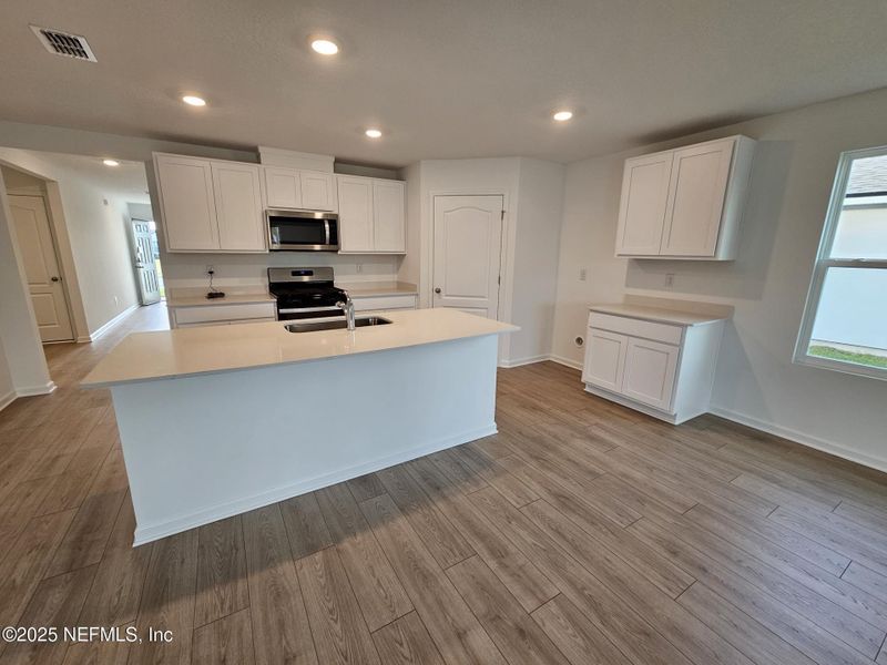 Furnished interior view inside a new home in Entrada, St. Augustine (Image 25).
