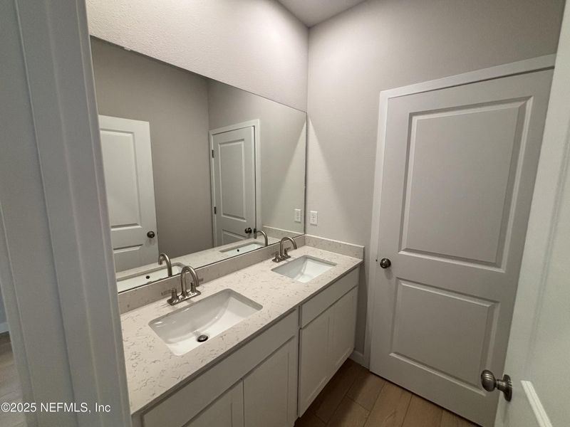 Furnished interior view inside a new home in The Magnolia Series at Reserve East, Flagler Beach (Image 9).