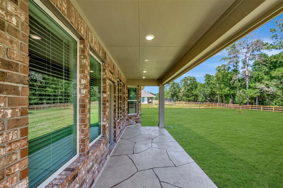 Exterior details and patio area of a home in Lone Star Landing, Montgomery (Image 27). Exterior details and patio area of a home in Lone Star Landing, Montgomery (Image 27).