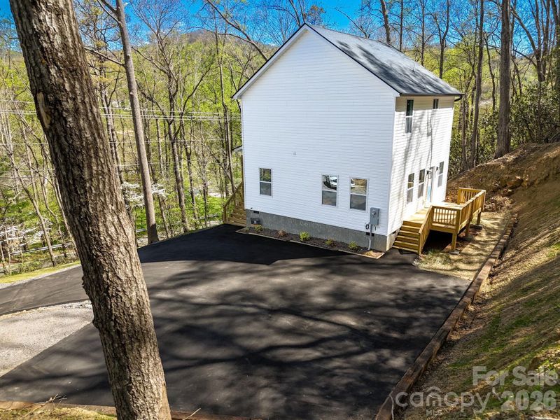 Exterior details and patio area of a home in , Fairview (Image 26).