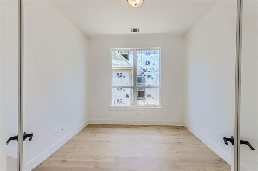 Empty room featuring light hardwood / wood-style floors