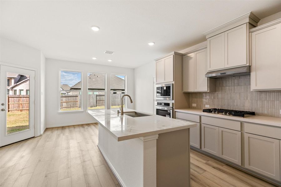 Furnished interior view inside a new home in Coastal Point, League City (Image 7).