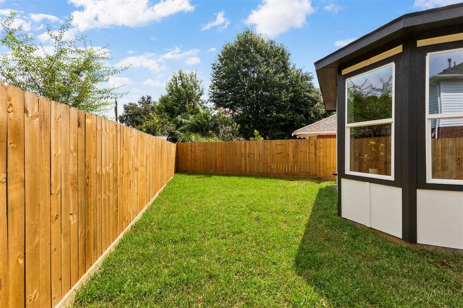 Exterior details and patio area of a home in , Spring (Image 28).