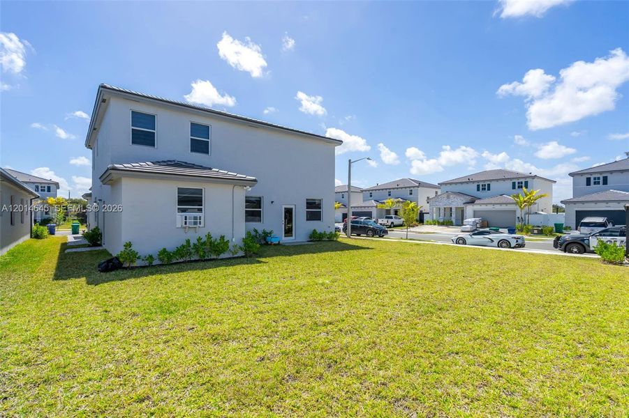 Exterior details and patio area of a home in , Miami (Image 3).