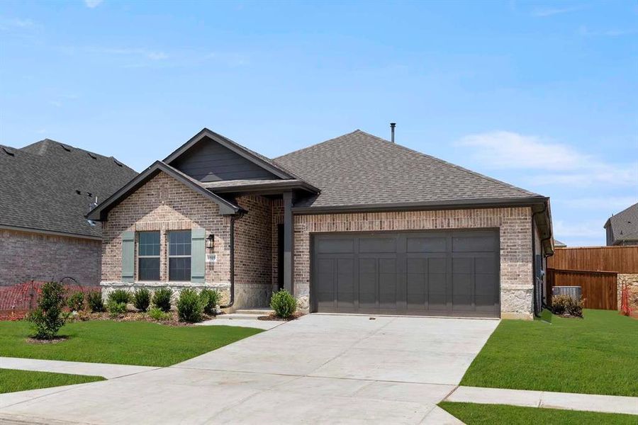 Front exterior of a new home in Brookshire at Legacy Hills-60s, Celina, TX, highlighting curb appeal (Image 1). Front exterior of a new home in Brookshire at Legacy Hills-60s, Celina, TX, highlighting curb appeal (Image 1).
