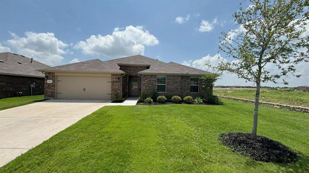 Front Elevation - D.R. Horton's Irving Floorplan Elevation A - All Home and community information, including pricing, included features, terms, availability and amenities, are subject to change at any time without notice or obligation. All Drawings, pictures, photographs, video, square footages, floor plans, elevations, features, colors and sizes are approximate for illustration purposes only and will vary from the homes as built.