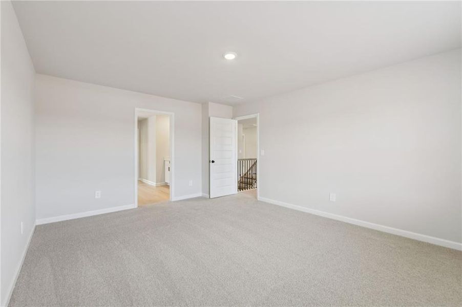 Spacious, unfurnished interior of a new home in Vines at Mill Creek - Estate Series, Braselton (Image 13). Spacious, unfurnished interior of a new home in Vines at Mill Creek - Estate Series, Braselton (Image 13).