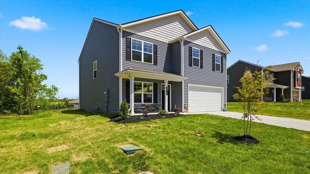 Front exterior of a new home in Oak Hill, Vonore, TN, highlighting curb appeal (Image 19).