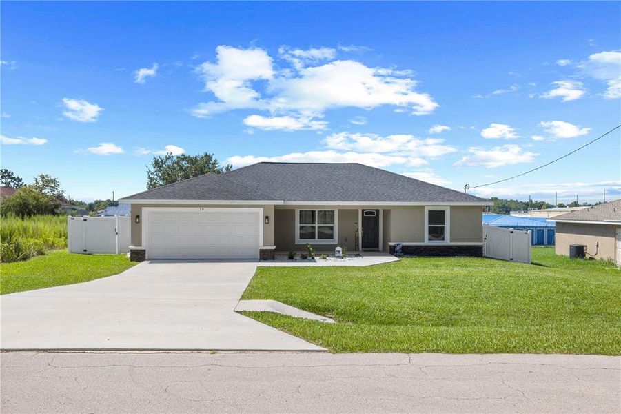 Front exterior of a new home in , Ocala, FL, highlighting curb appeal (Image 22).