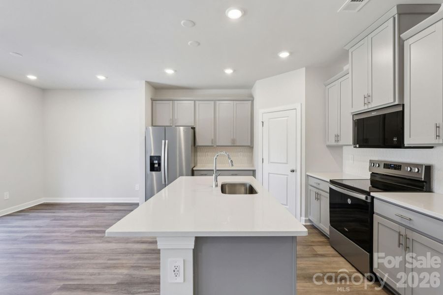 Furnished interior view inside a new home in Harper Landing, Stanley (Image 5).