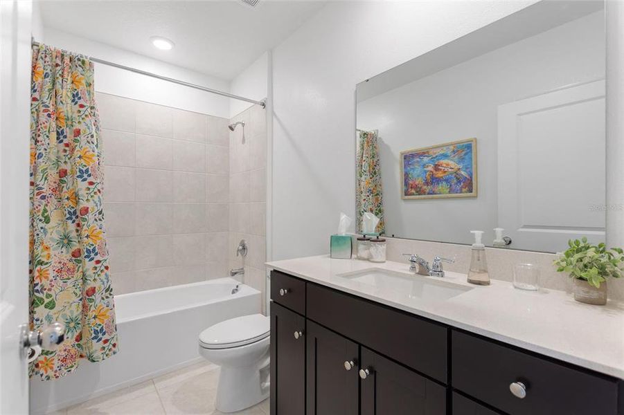 Furnished interior view inside a new home in Lawson Dunes: Estate Collection, Haines City (Image 8).