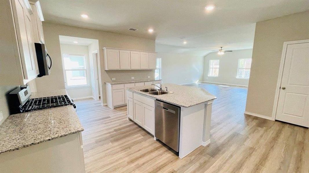 Kitchen - D.R. Horton's Kingston Floorplan Elevation C - All Home and community information, including pricing, included features, terms, availability and amenities, are subject to change at any time without notice or obligation. All Drawings, pictures, photographs, video, square footages, floor plans, elevations, features, colors and sizes are approximate for illustration purposes only and will vary from the homes as built. Kitchen - D.R. Horton's Kingston Floorplan Elevation C - All Home and community information, including pricing, included features, terms, availability and amenities, are subject to change at any time without notice or obligation. All Drawings, pictures, photographs, video, square footages, floor plans, elevations, features, colors and sizes are approximate for illustration purposes only and will vary from the homes as built.