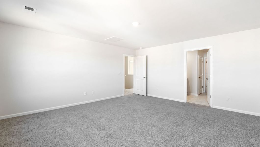 Spacious, unfurnished interior of a new home in Magnolia at the Bluffs Phase 3, Freeport (Image 22).