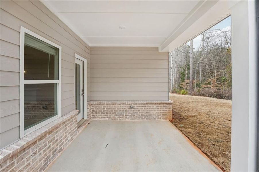 Exterior details and patio area of a home in Westmont Preserve, Powder Springs (Image 28).
