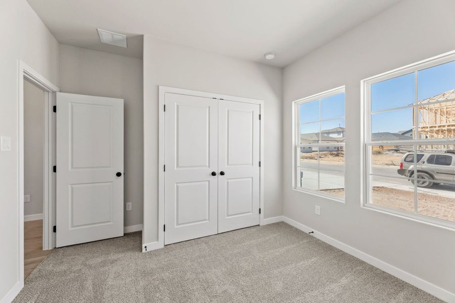 Representative unfurnished interior of a home built from the Tularosa by Hakes Brothers in Hickory Ridge, Elmendorf (Image 14).