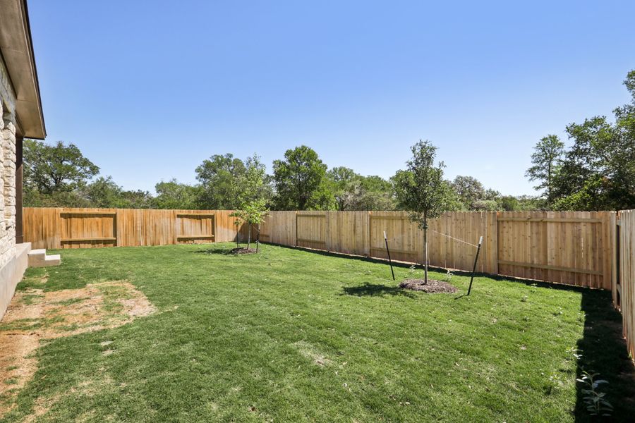 Exterior details and patio area of a home in Persimmon, Buda (Image 17).
