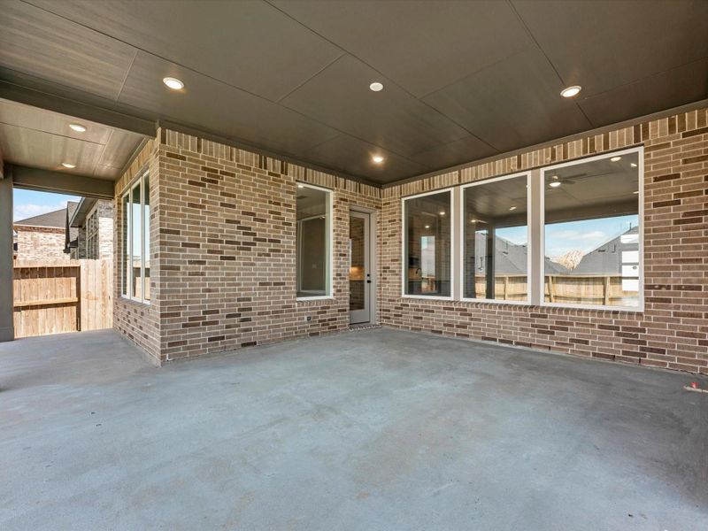 Exterior details and patio area of a home in Pecan Ridge, Fulshear (Image 3). Exterior details and patio area of a home in Pecan Ridge, Fulshear (Image 3).