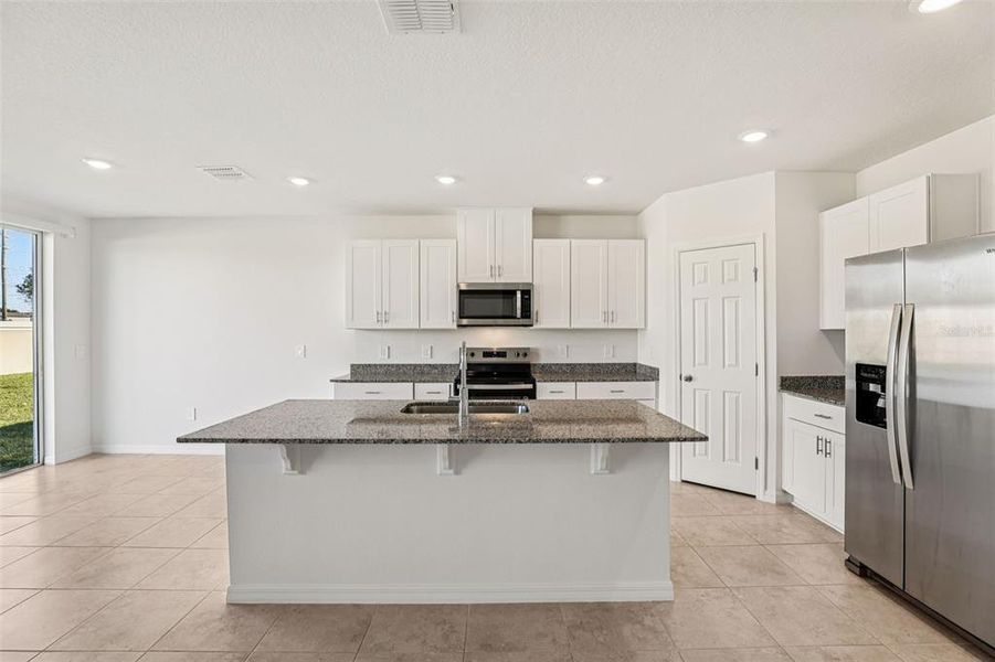 Furnished interior view inside a new home in Lawson Dunes - Signature Series, Haines City (Image 10). Furnished interior view inside a new home in Lawson Dunes - Signature Series, Haines City (Image 10).