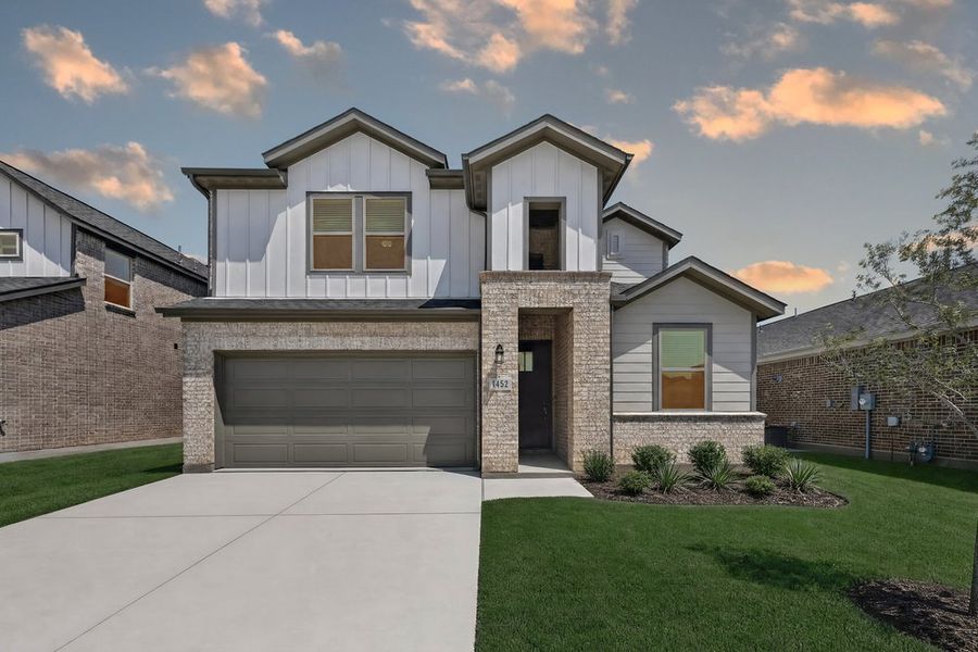 Front exterior of a new home in Madero 50s, Fort Worth, TX, highlighting curb appeal (Image 2). Front exterior of a new home in Madero 50s, Fort Worth, TX, highlighting curb appeal (Image 2).