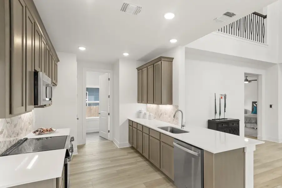 Furnished interior view inside a new home in Grande Estates, Bertram (Image 11). Furnished interior view inside a new home in Grande Estates, Bertram (Image 11).