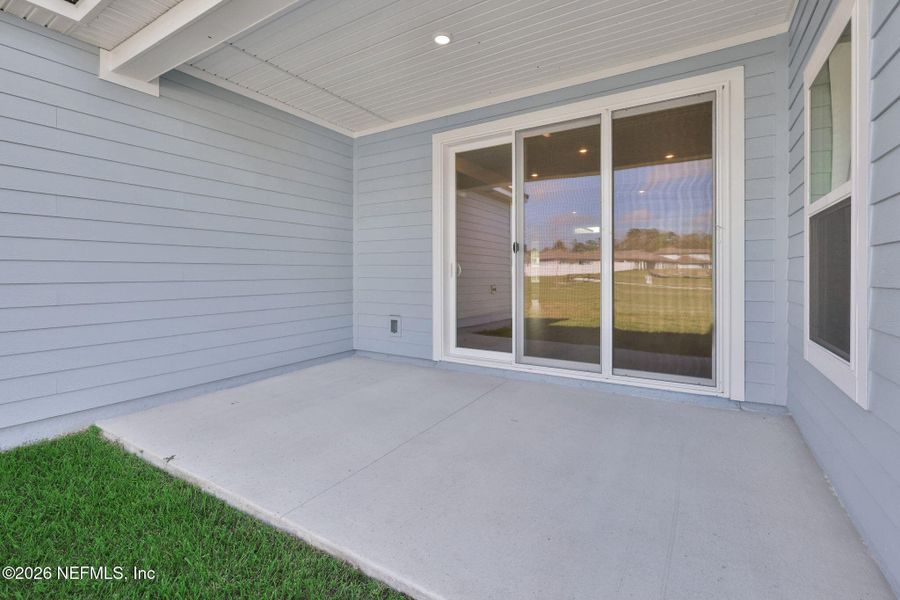 Exterior details and patio area of a home in Jennings Farm, Middleburg (Image 3).