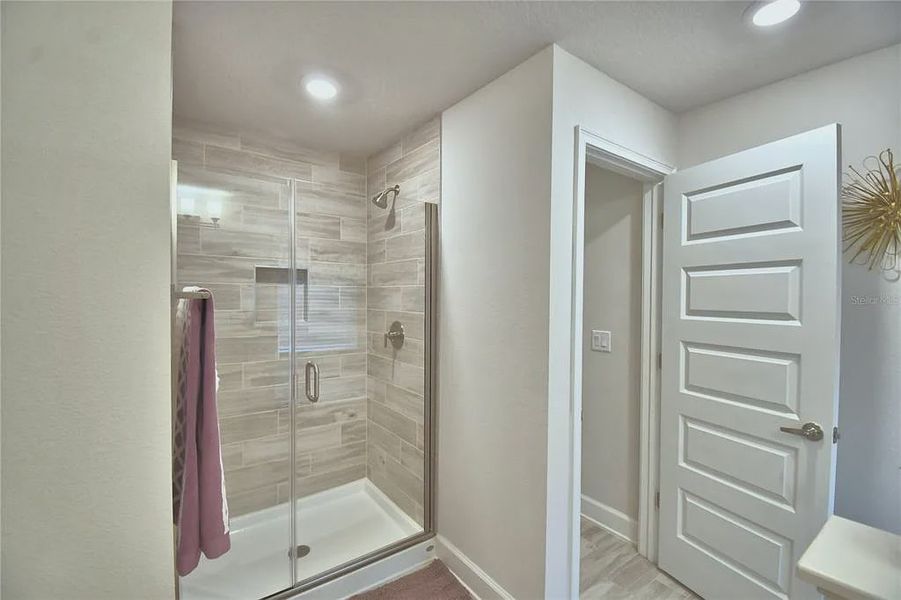 Furnished interior view inside a new home in Lake Juliana Estates, Auburndale (Image 40).