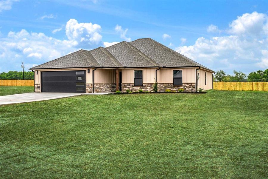 Front exterior of a new home in , Sumner, TX, highlighting curb appeal (Image 1). Front exterior of a new home in , Sumner, TX, highlighting curb appeal (Image 1).