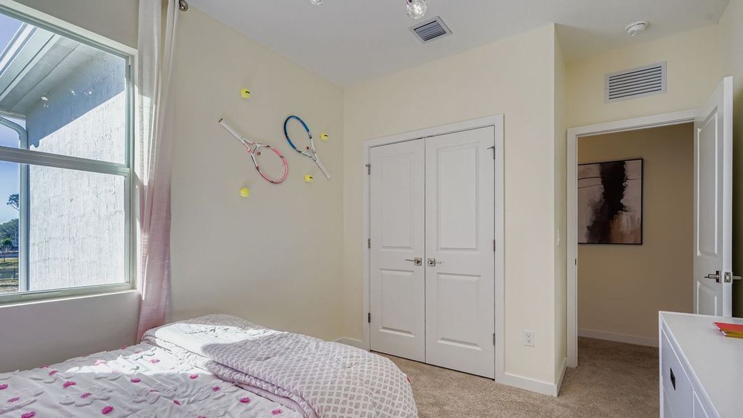Representative furnished interior of a home built from the Waverly by D.R. Horton in Lakeside Landing, Royal Palm Beach (Image 24).
