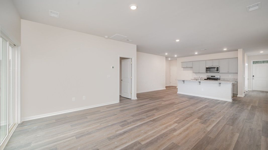 Spacious, unfurnished interior of a new home in Indigo Preserve, Leland (Image 14).