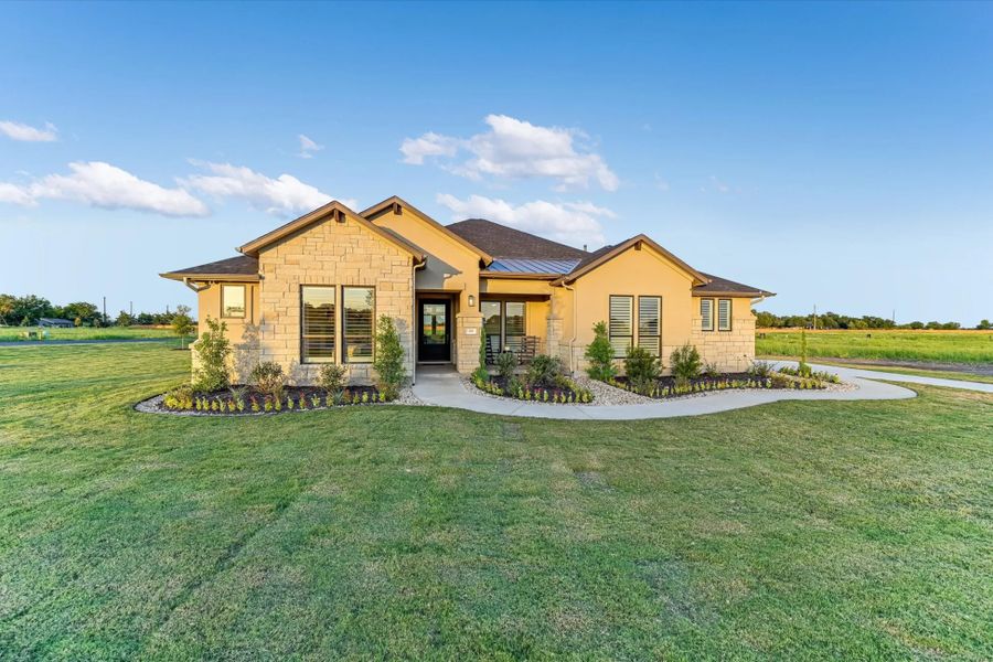 Representative exterior photo of a completed home built from the Bandera II by Giddens Homes in Leander Estates, Leander, TX (Image 10).