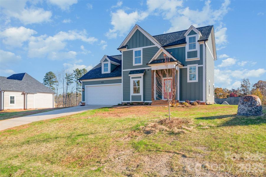 Front exterior of a new home in , China Grove, NC, highlighting curb appeal (Image 17).