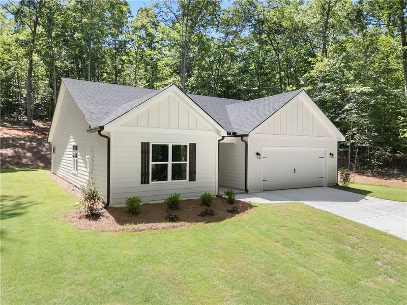 Front exterior of a new home in , Martin, GA, highlighting curb appeal (Image 2). Front exterior of a new home in , Martin, GA, highlighting curb appeal (Image 2).