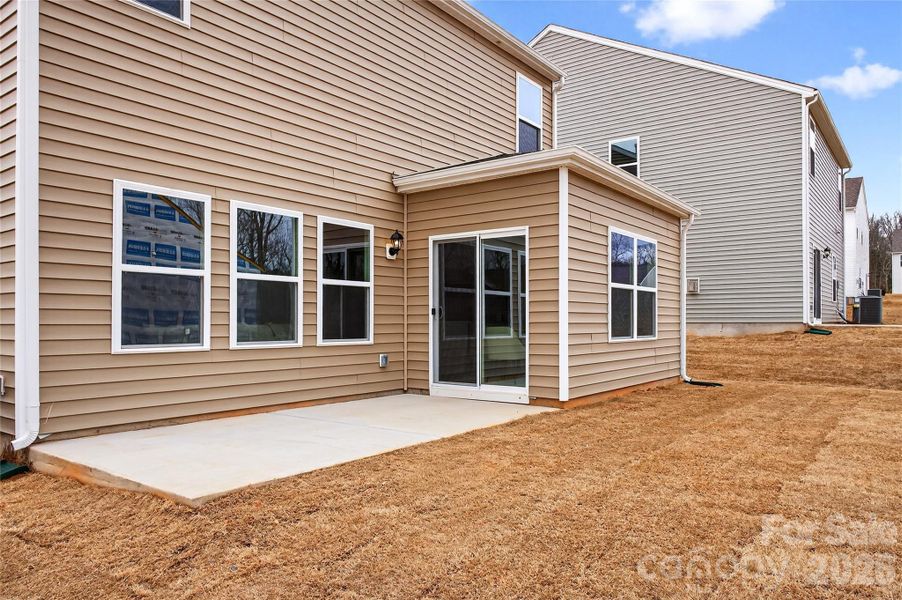 Exterior details and patio area of a home in Reedy Creek Preserve, Charlotte (Image 3).